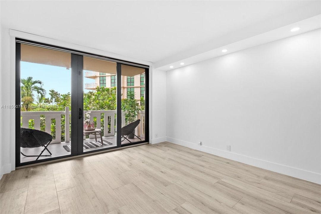 New high impact floor-to-ceiling windows and sliding doors.