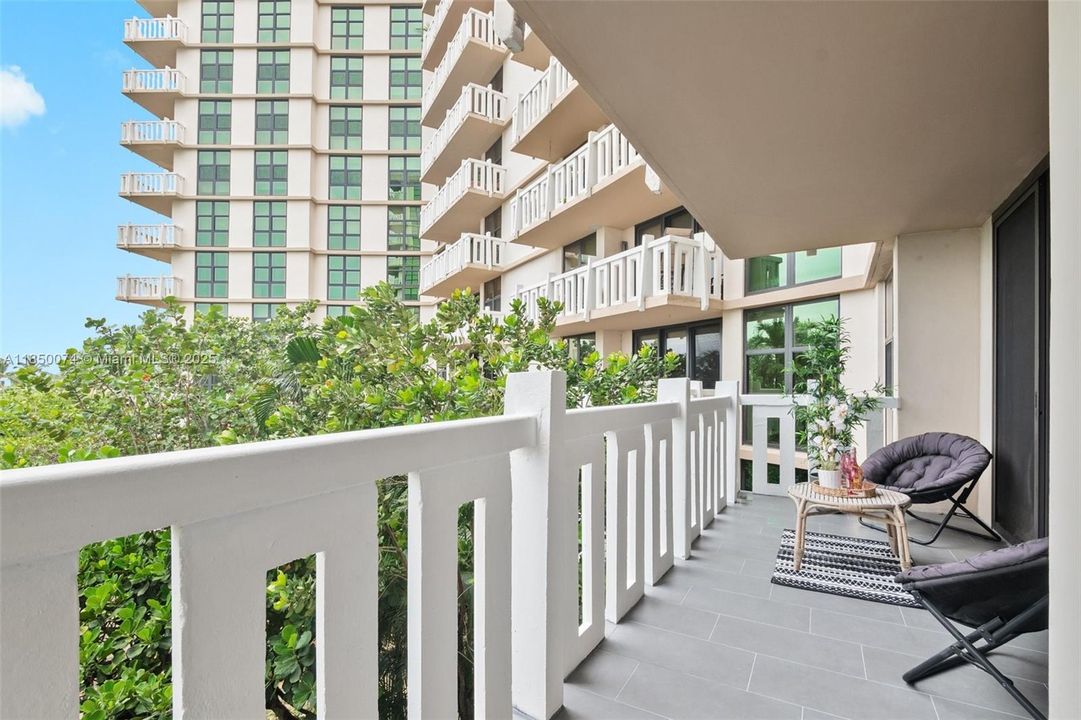 Enjoy sunsets from this spacious balcony that faces West.