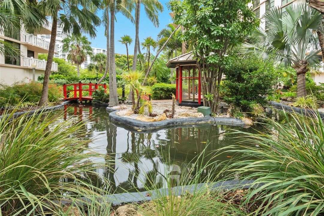 Beautiful gardens feature Chinese inspired walkways.
