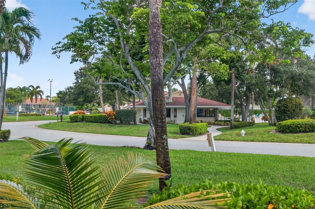 Walk right out your front door or patio to the pool right across the street