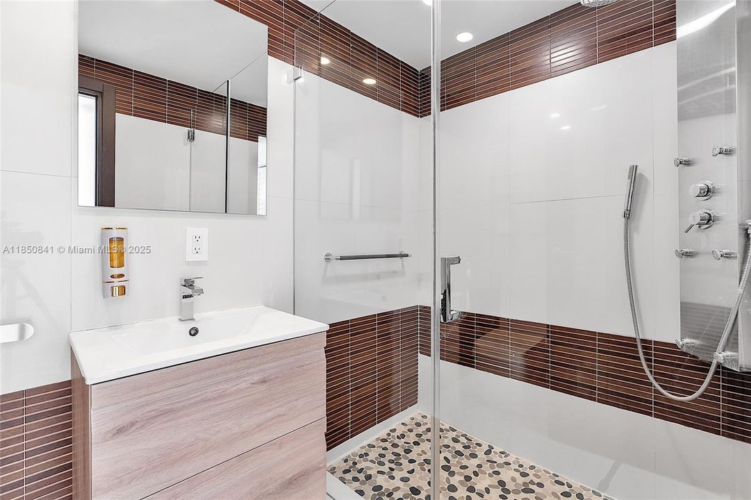 Bathroom by guest bedroom