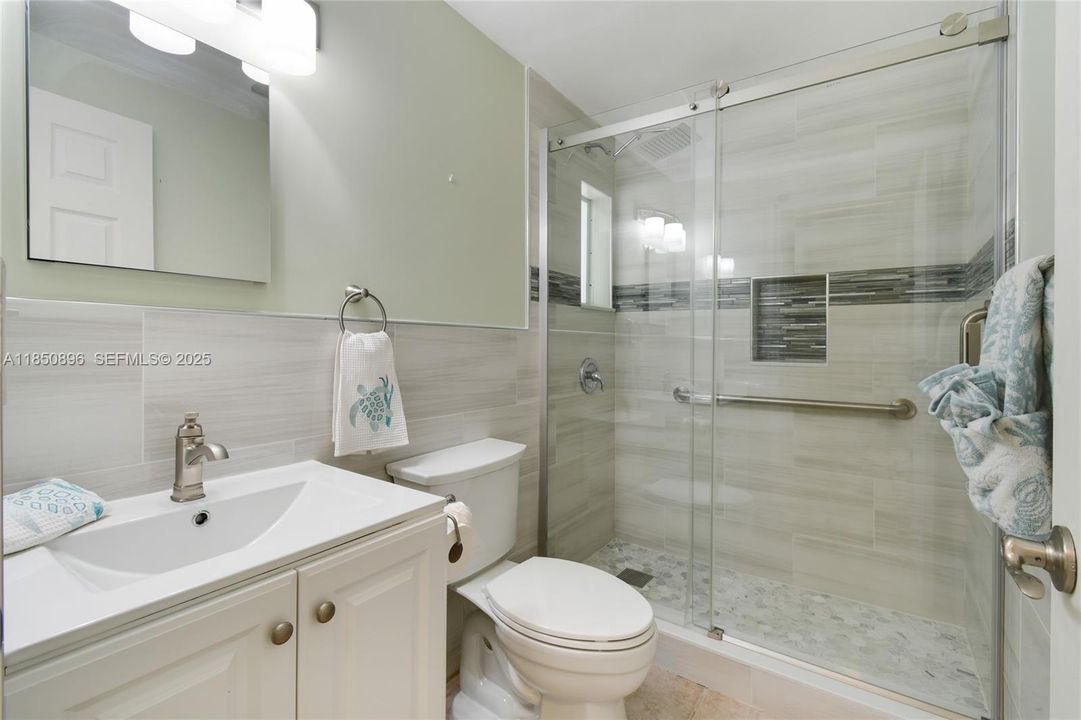 New Sink/Vanity, New Toilet, New Shower