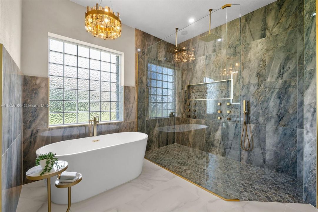 Relax in the elegant primary bathroom complete with soaking tub, large walk -in shower.