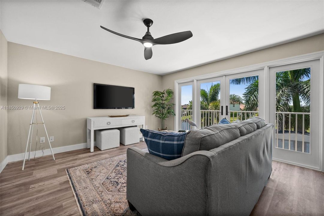 Upstairs Loft/In-Law Suit/Flex Room with a huge walk-in closet, bathroom and balcony.