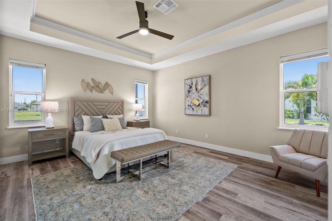 Large Primary Bedroom with tray ceiling