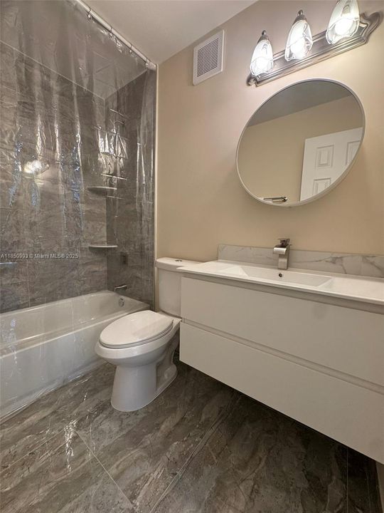 Bathroom 1 with Shower and Soaking Tub and Marble Corner Shelves