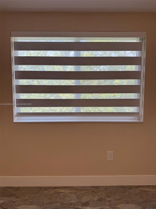 Zebra Blinds with BlackOut Shade in both Bedrooms