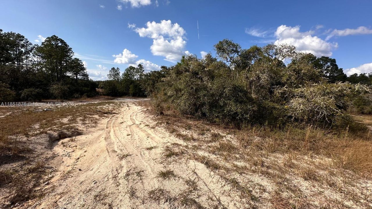Active With Contract: $14,000 (0.50 acres)