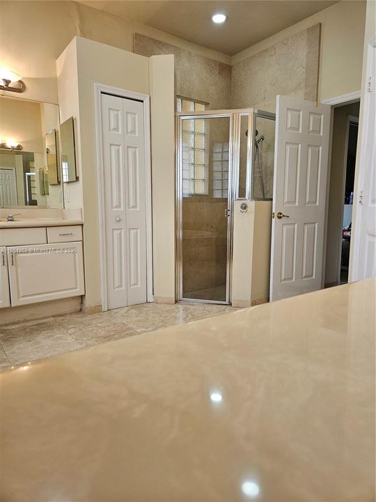 Single Vanity, Linen closet, step down shower