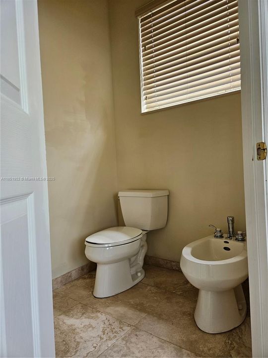 Toilet Room / Water Closet with Bidet