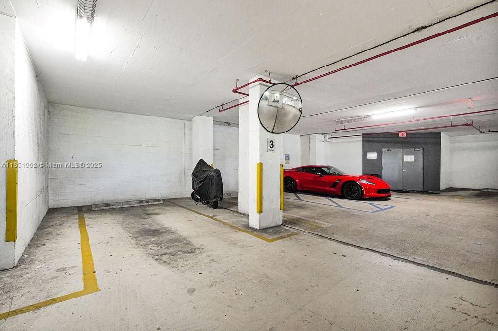 Covered parking garage with secure access and easy building entry.