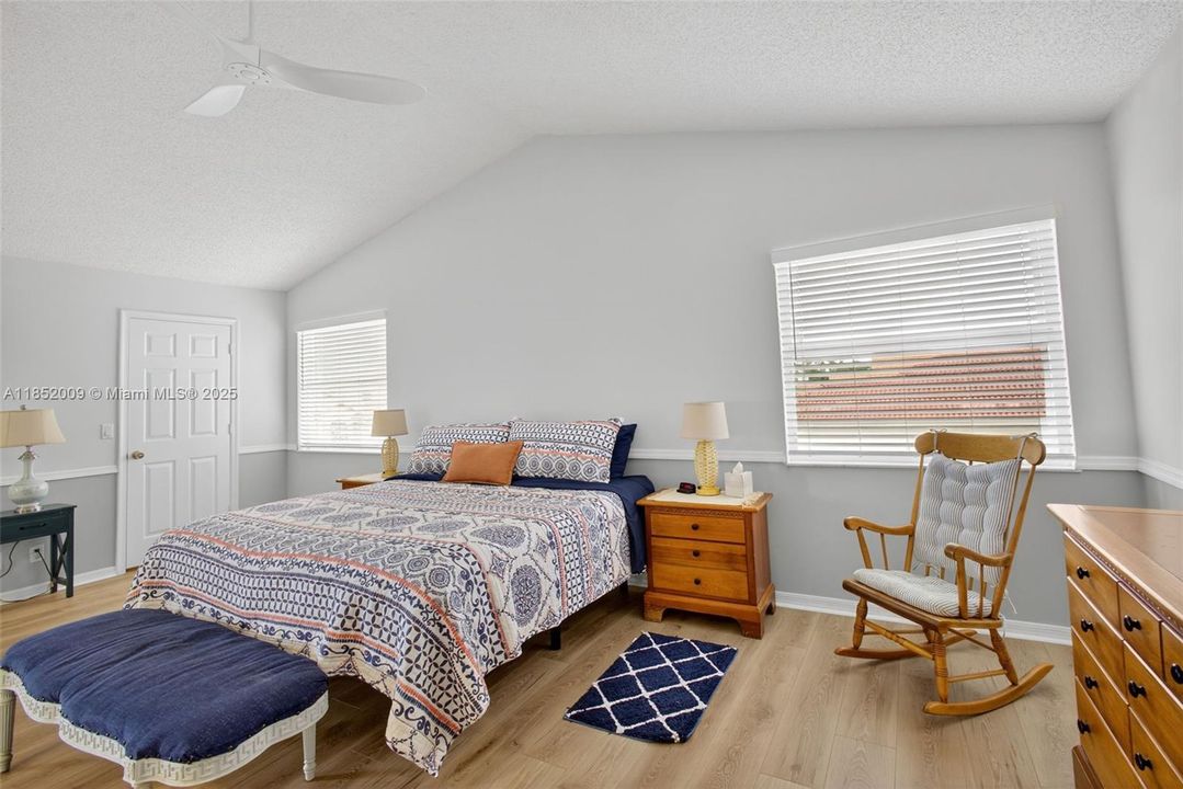 Large primary ensuite with his and hers walk-in closets