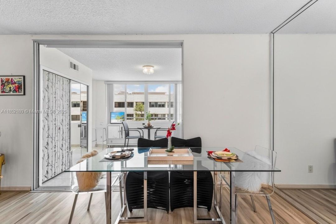 Second bedroom photo virtually enhanced to show wall option.