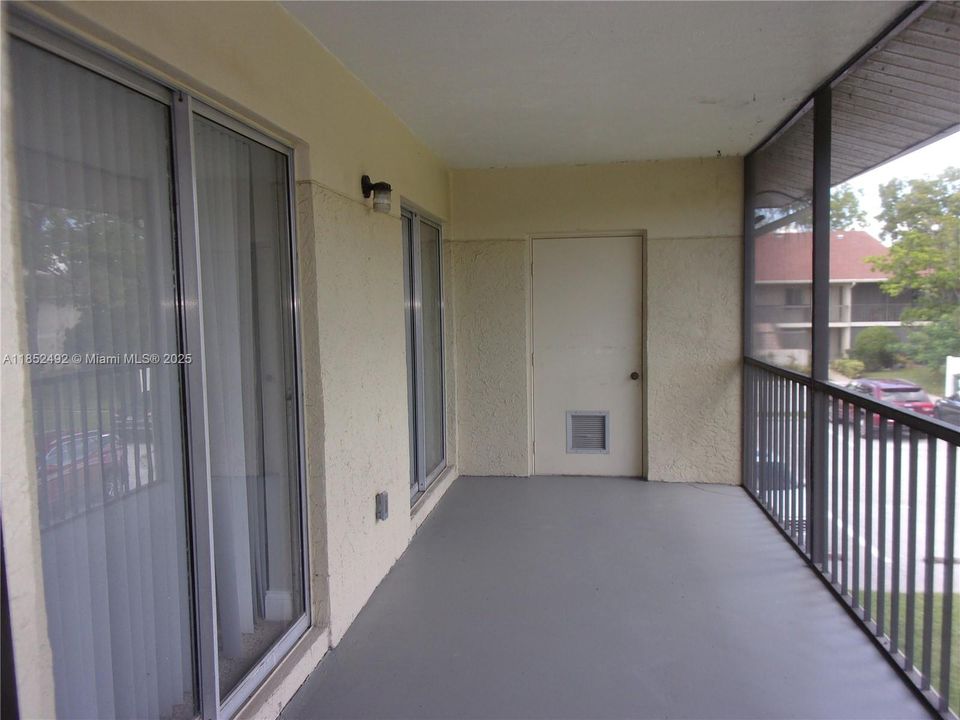 Screen patio is accessed by both bedrooms or the exterior screen door. Patio includes large storage closet.