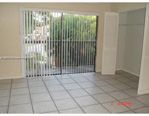 Taken when vacant, primary bedroom with balcony