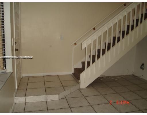 stairways taken when vacant, with storage space under stairs