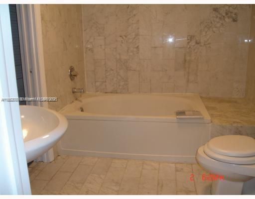 Previous Photo Main Bathroom with roman tub - picture taken when vacant