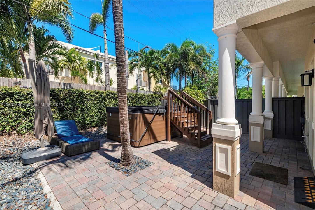 Backyard features a swim spa