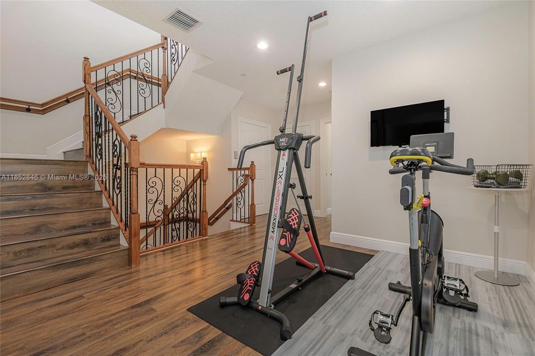 2nd floor den - use as home office, workout area, sitting/music area