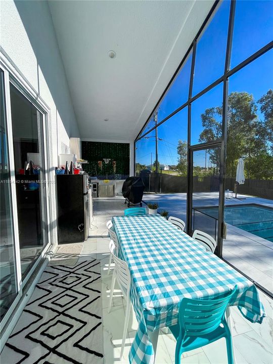 Covered & Screened Outdoor Kitchen & Dining