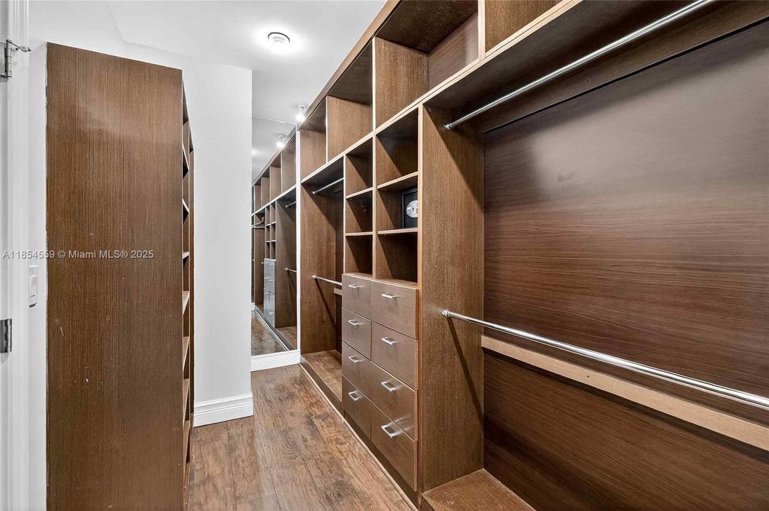 1 OF 2 WALK-IN CLOSETS FOR PRIMARY