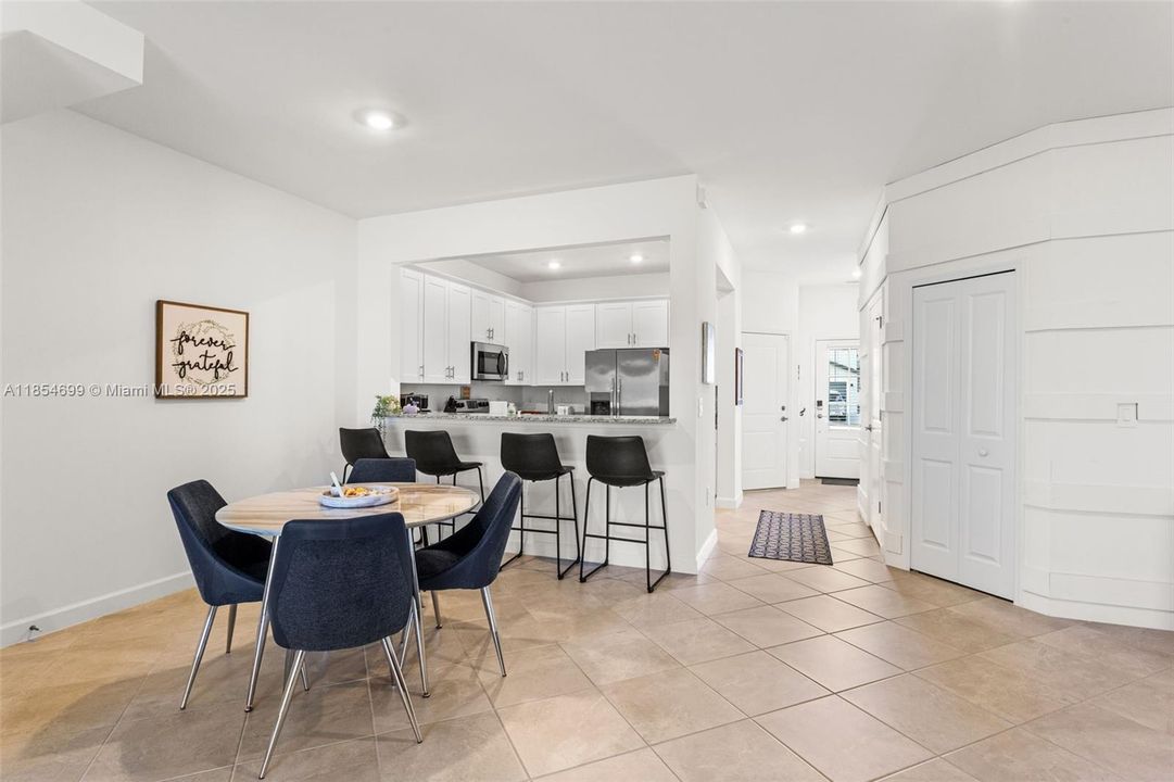 Adjoining living & dining areas are open, airy & perfect for both relaxing & entertaining.