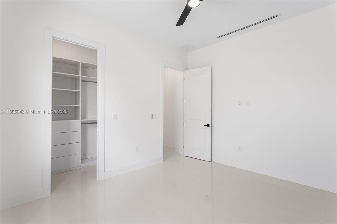 ADDITIONAL GUEST BEDROOM thoughtfully arranged to GIVE EVERYONE THEIR OWN SPACE!