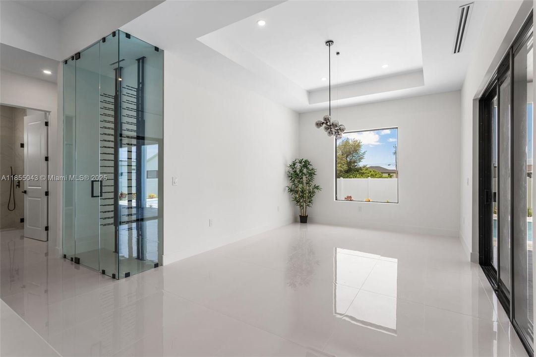 Formal Dining Room with Big Picture Window and Chandelier