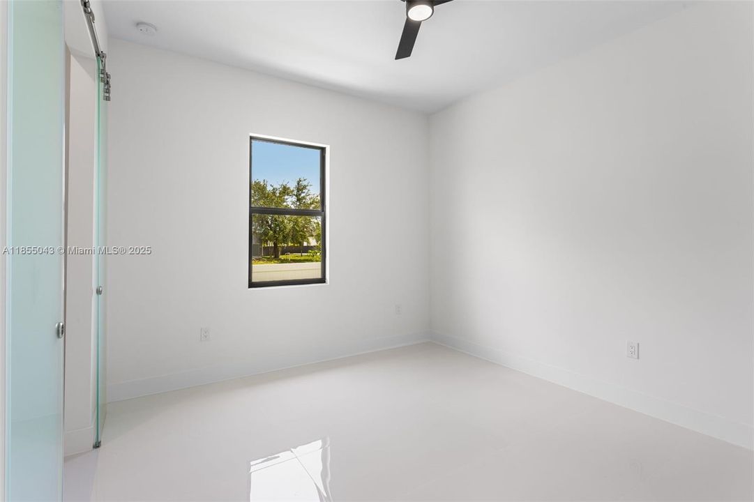 The SPLIT BEDROOM LAYOUT ensures PRIVACY with a LARGE GUEST SUITE, separate HALL BATHROOM