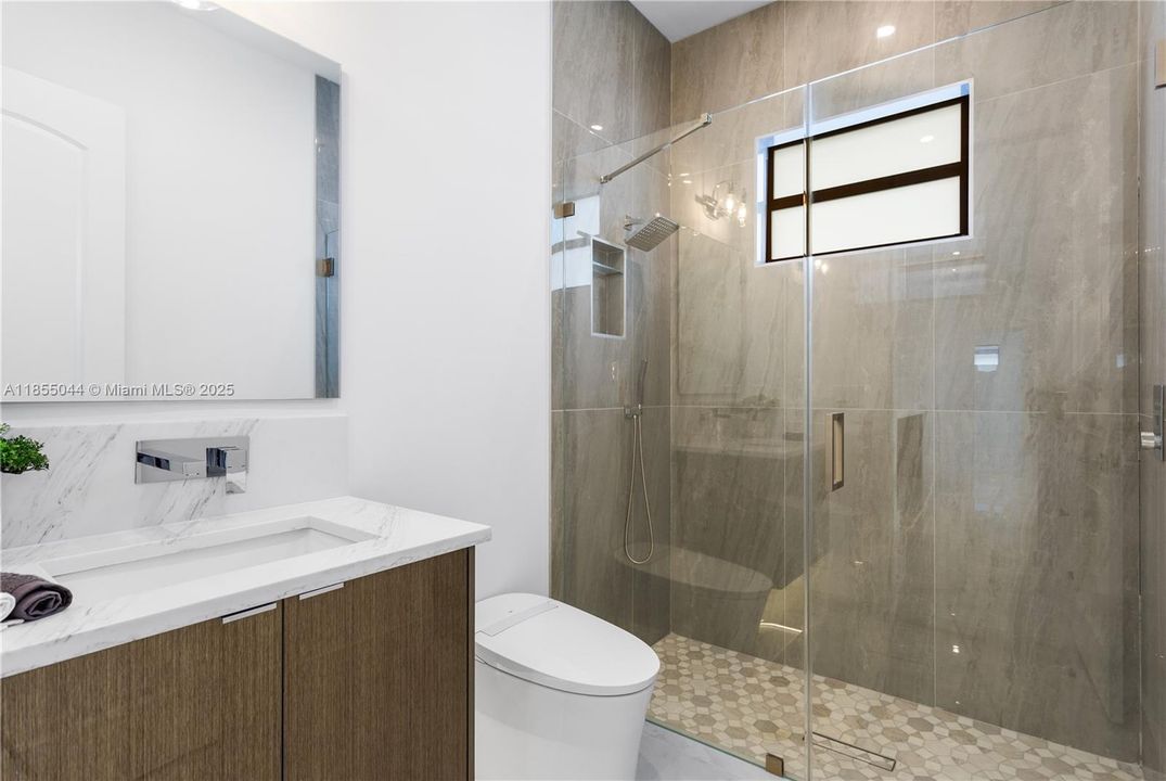 Secondary Primary Bathroom with same features as primary bathroom