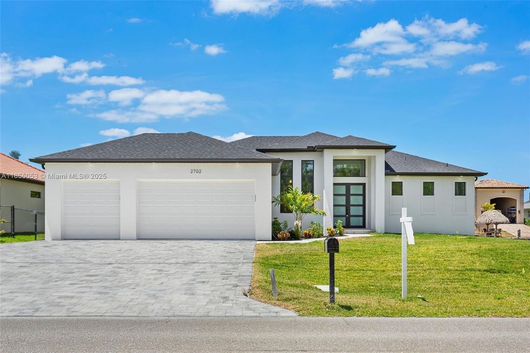 Come explore this beautifully designed home with DIRECT GULF ACCESS & AMPLE OUTDOOR ENTERTAINMENT SPACE, located in NW Cape Coral Paradise, offering the ideal mix of style, convenience & location!