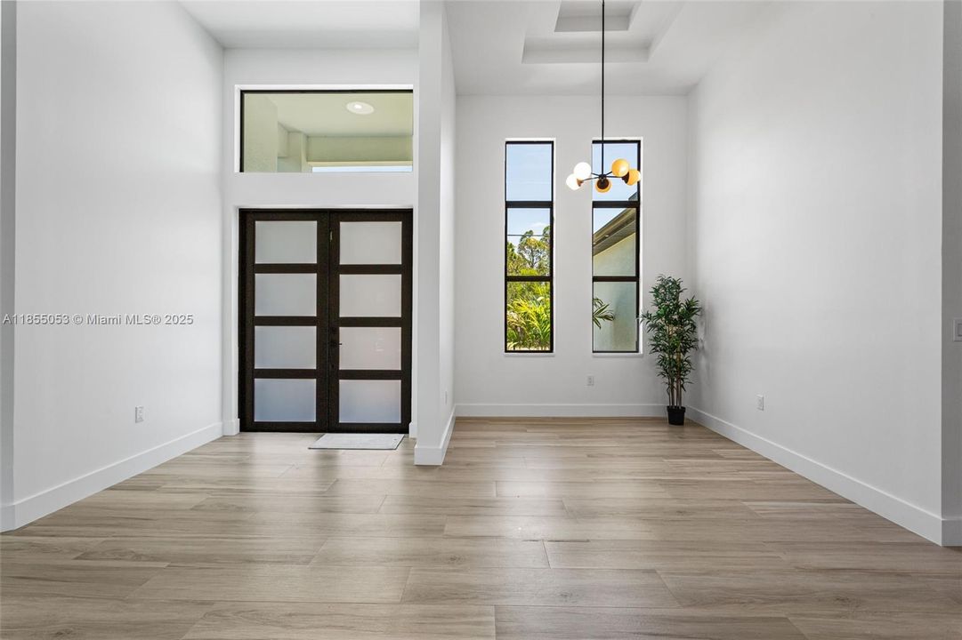 Interior details are designed for COMFORT & STYLE, including TILE FLOORING THROUGHOUT & impact-resistant doors & windows for added peace of mind.