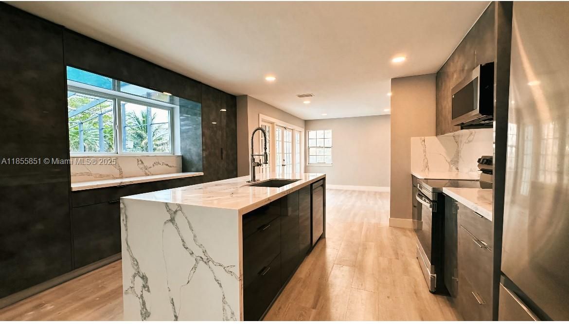 Newly updated kitchen add modern elegance and functionality.