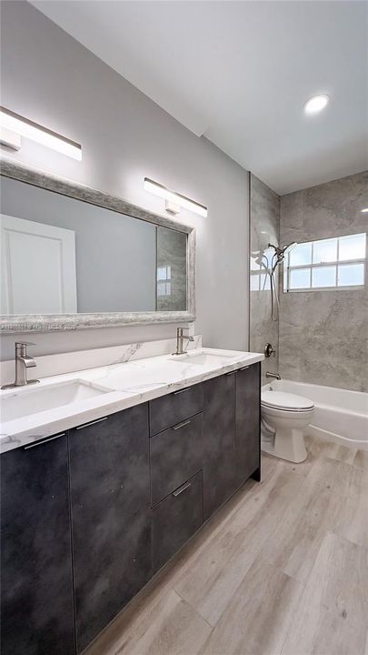 Upstairs secondary bathroom is updated, spacious and comfortable.