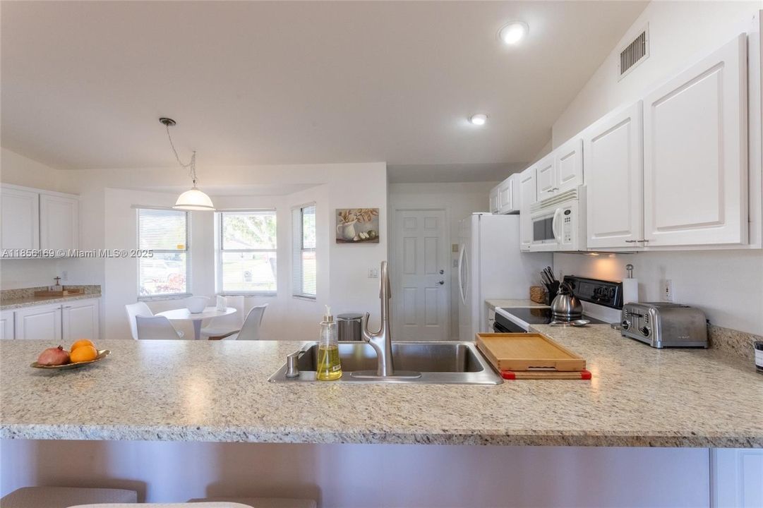 Huge kitchen that connects to the garage