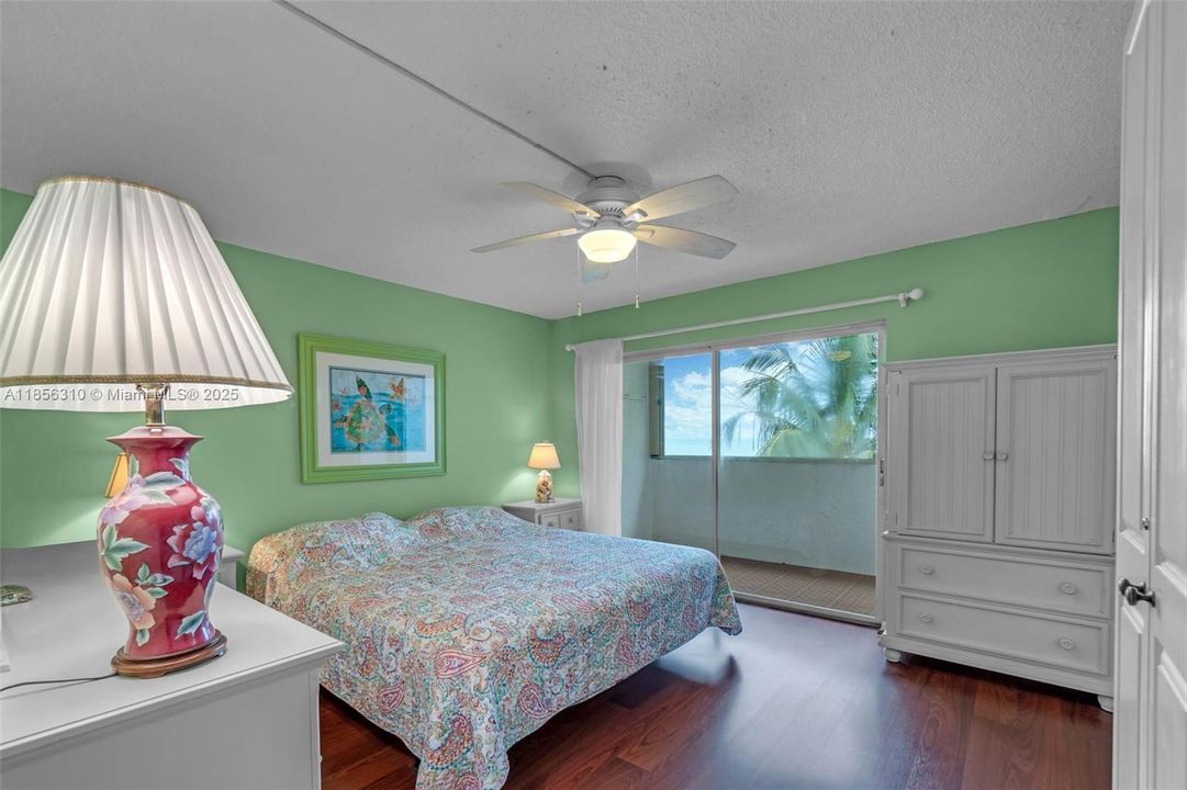 LARGE PRIMARY BEDROOM OCEAN VIEW WITH NEW FLOORING