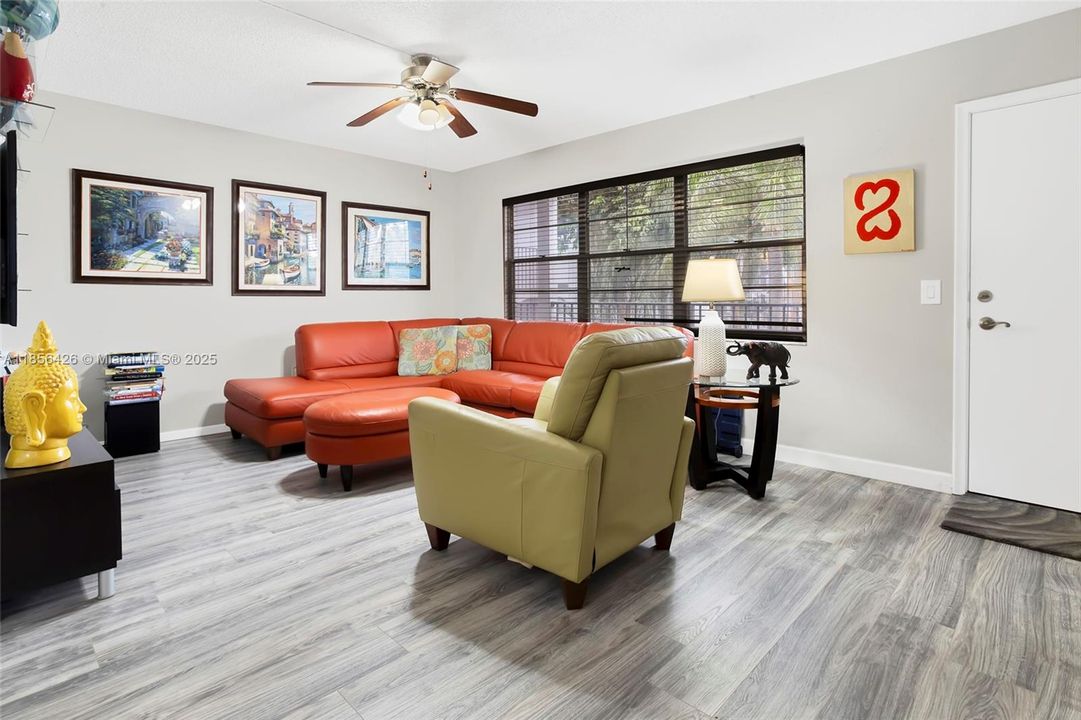 Spacious Living Room with Vinyl Flooring