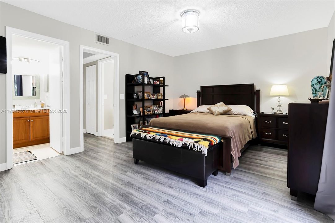 Clean & Neat Primary Bedroom and Bathroom