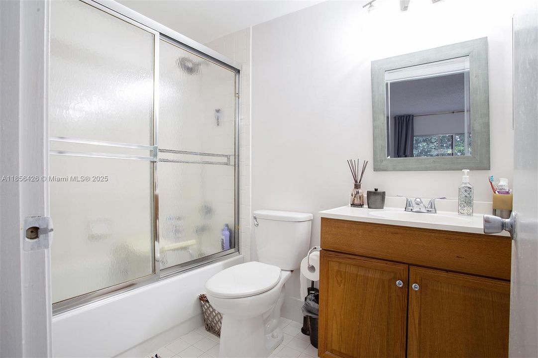 Clean and Neat Primary Bath/Shower and Vanity