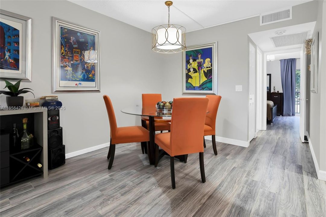 Clean and Neat Dining room W/Vinyl Floor