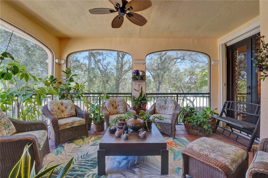 Oversized & Cozy screened-in patio