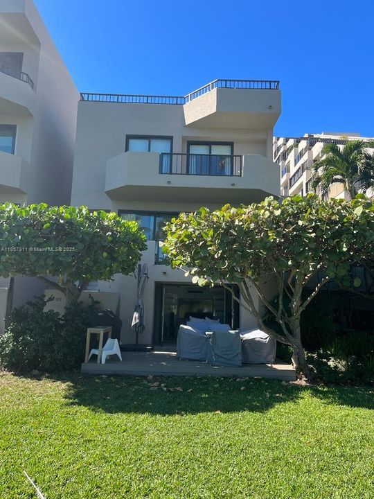 View from the beach of full townhouse
