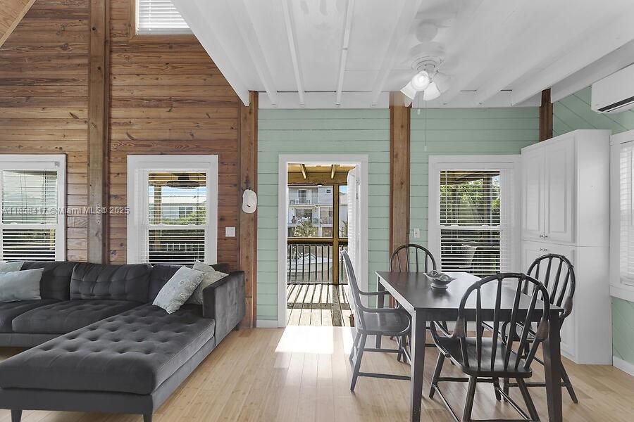 Exit to the spacious covered and screened terrace.