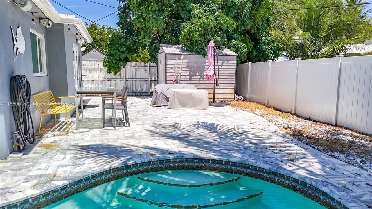 Outdoor Fireplace on Luxury Marble Pavers