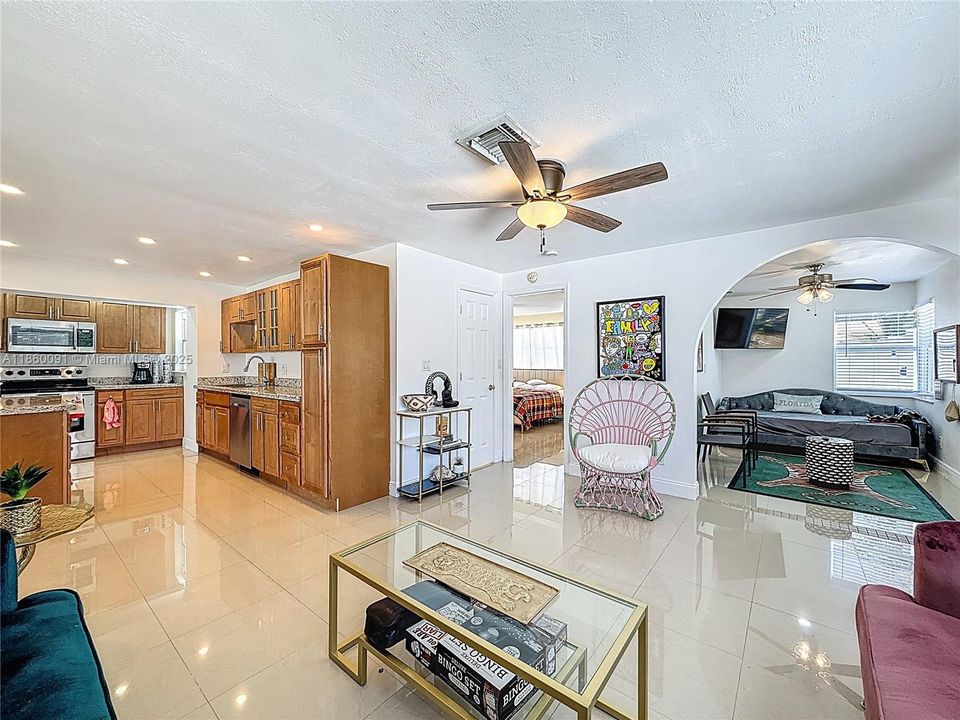 Emerald Green and Gold Appointed Living Room