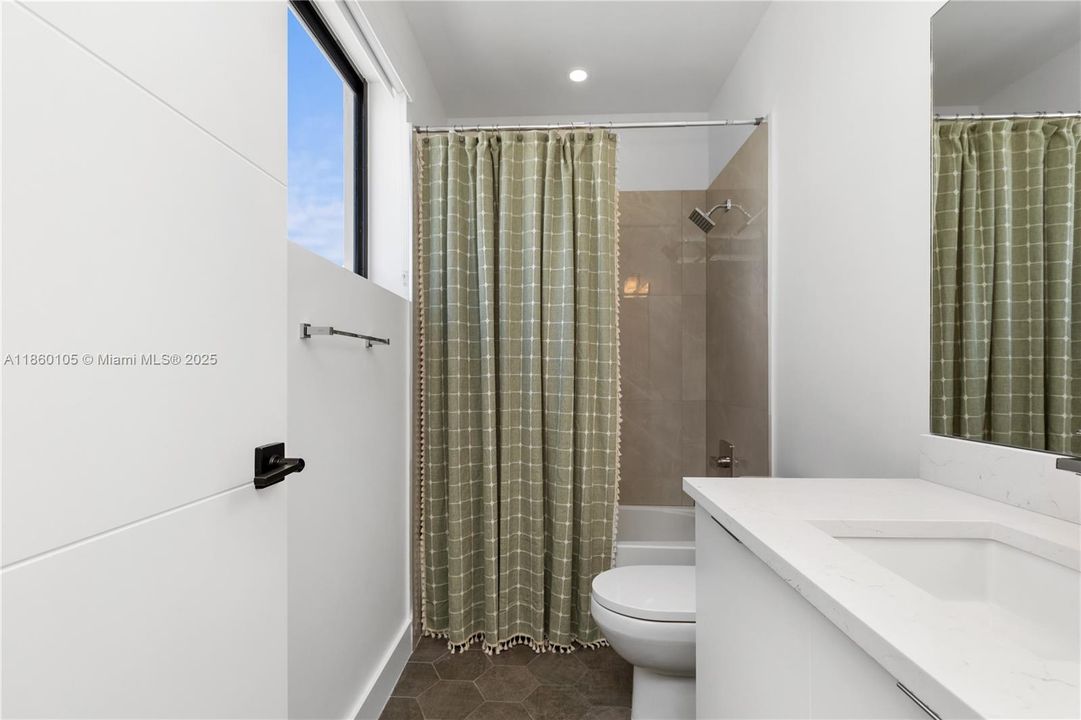 Second suite bathroom.