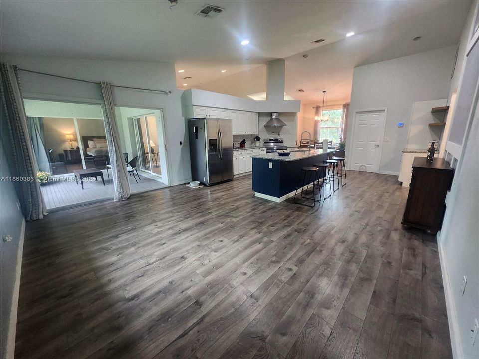 Large kitchen with an additional space you can make your own from a recreation area to a family room. Great for entertaining!