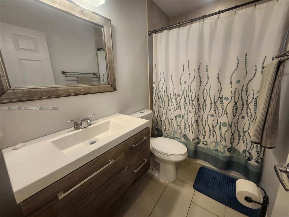 2nd Bathroom with Tub and Shower combination.
