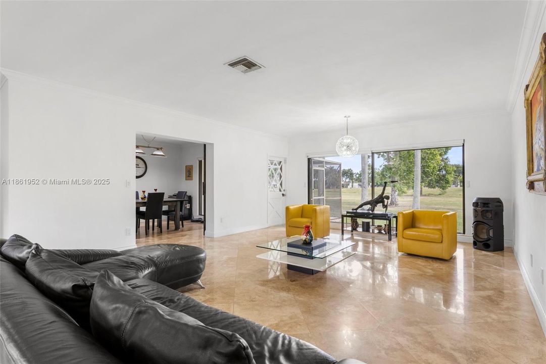 Living room with golf course views