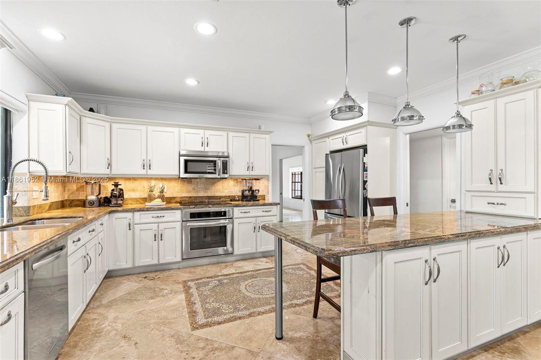 Renovated granite counter top open floor plan kitchen